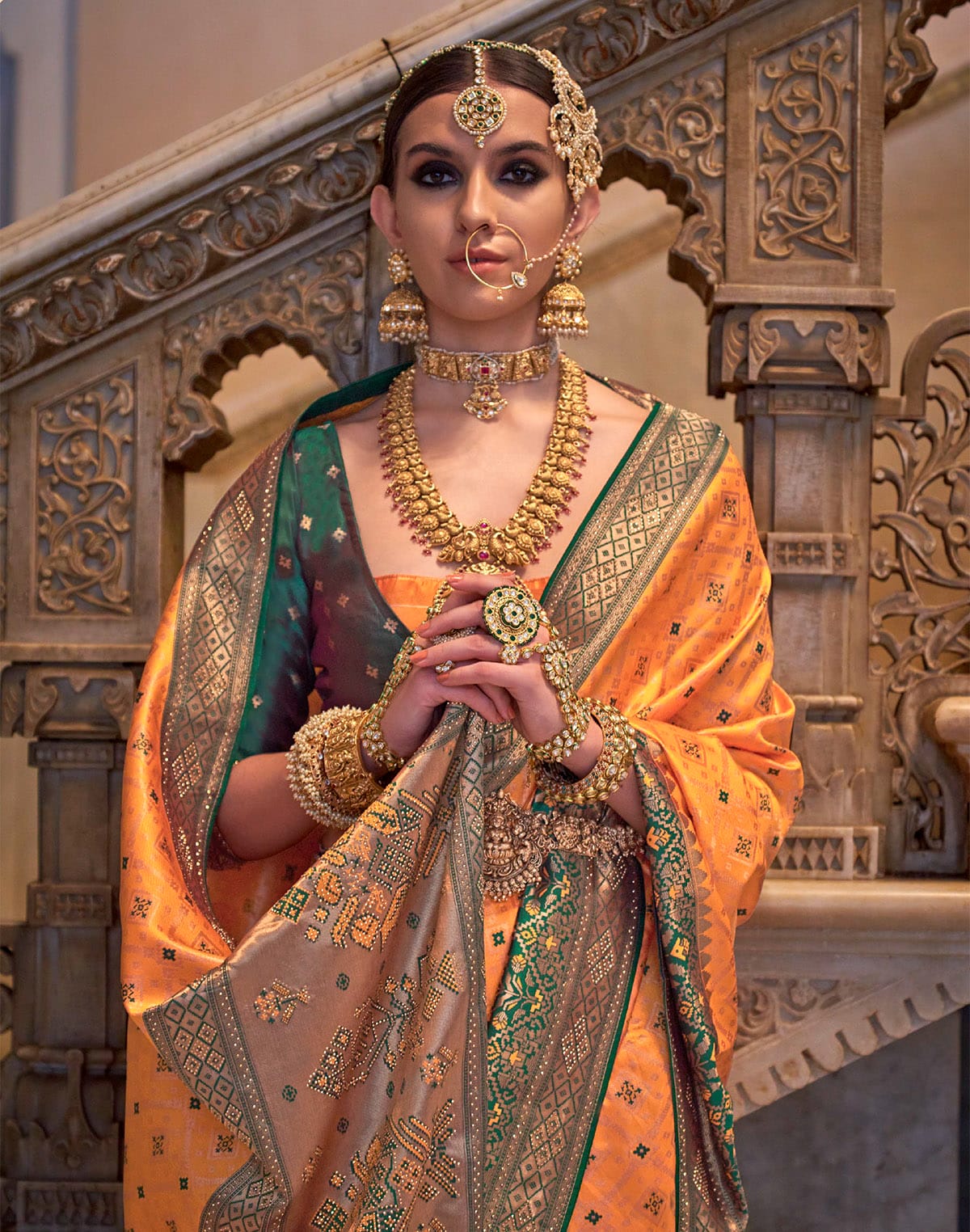 Collection of Orange Banaras Silk Stones work Saree in a gallery layout