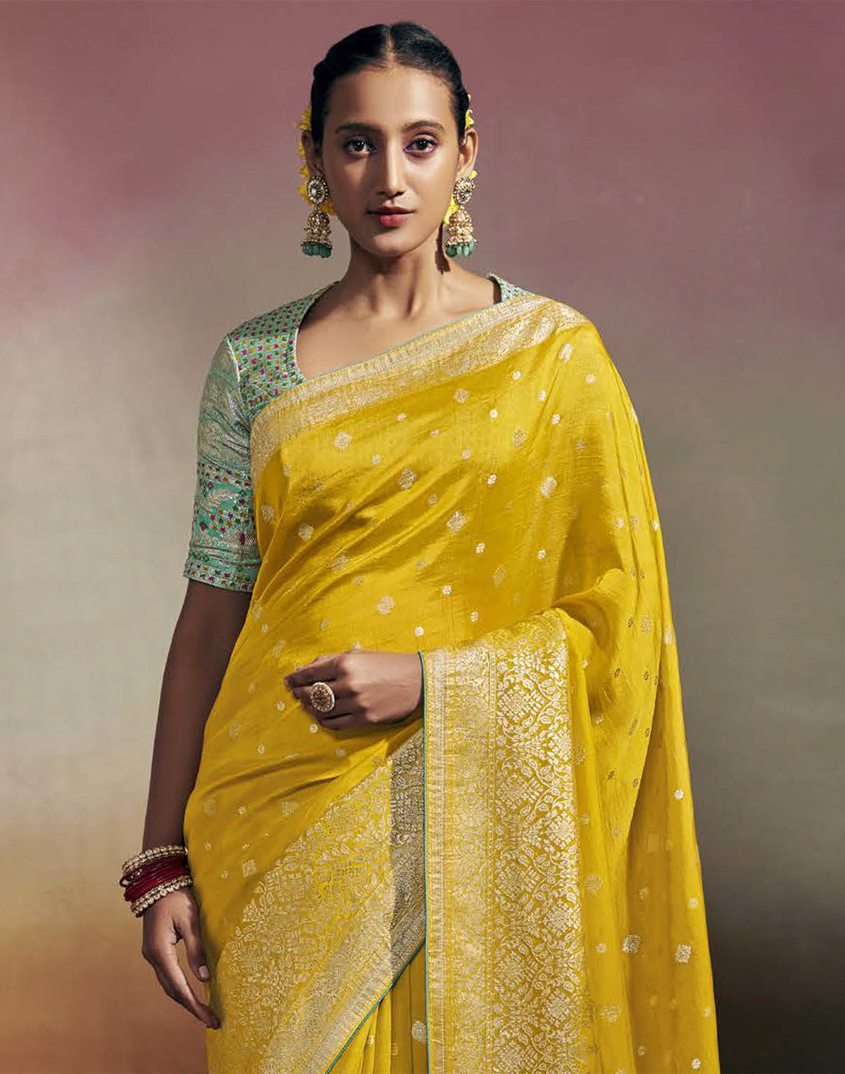 Collection of Vibrant Yellow Colour  Dola Silk Saree With Contrast Blouse in a gallery layout