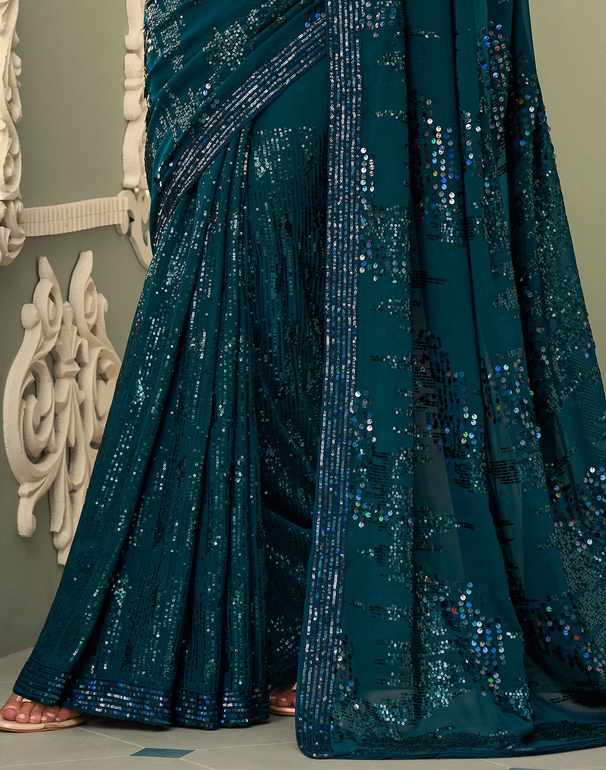 Collection of Peacock Blue Sequence work Georgette Saree in a gallery layout