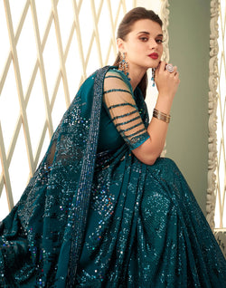 Collection of Peacock Blue Sequence work Georgette Saree in a gallery layout