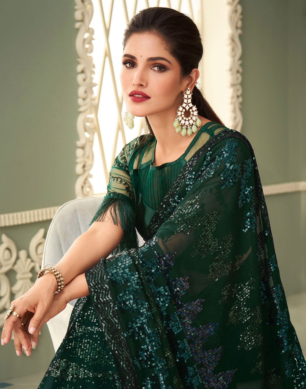 Collection of Sequence work Dark Green Georgette Saree in a gallery layout