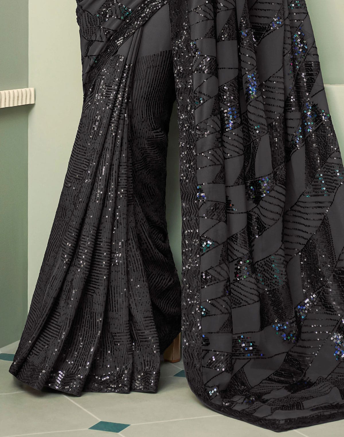 Collection of Beautiful Sequence work Georgette Saree in a gallery layout