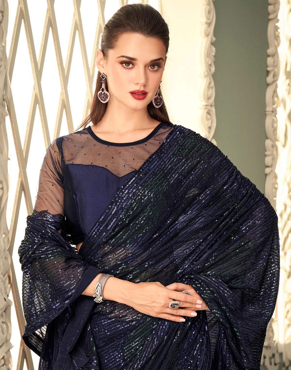 Collection of Navy Blue Georgette Fabric with Sequence Work Saree in a gallery layout