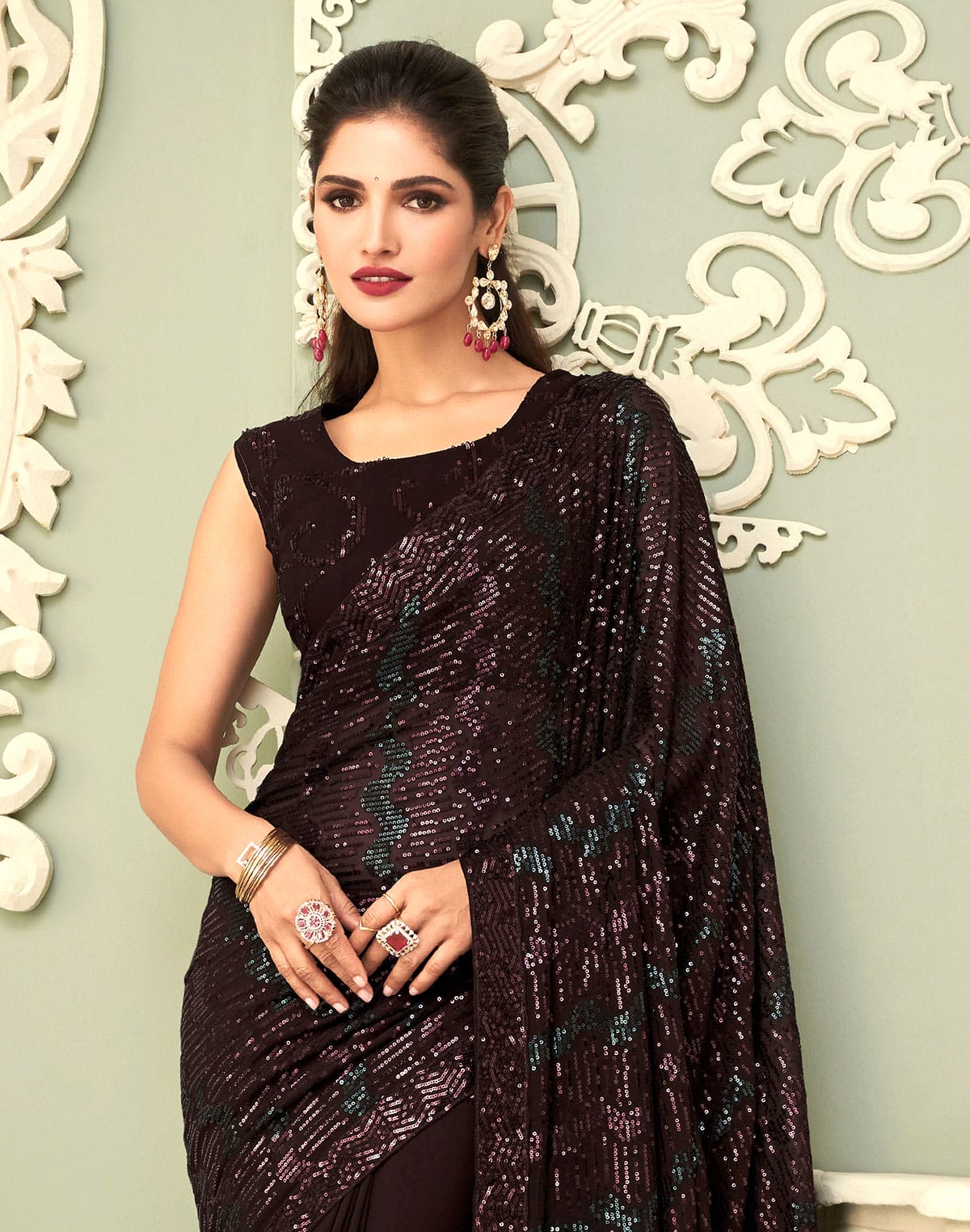 Collection of Wine all over heavy Sequence work Georgette Saree in a gallery layout