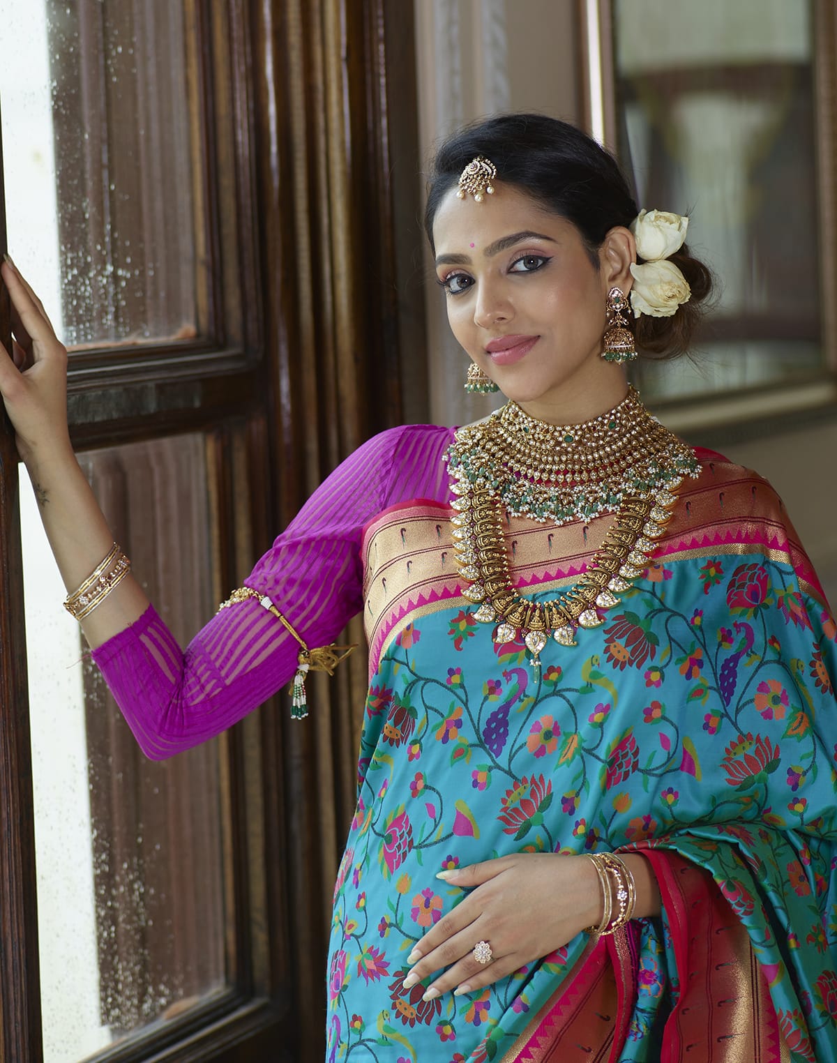 Collection of Peacock Blue Floral weaving Pure Paithani Saree in a gallery layout