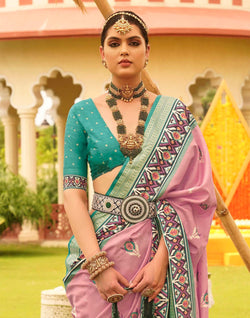 Collection of Charming Pink Patola Silk Designer Saree in a gallery layout