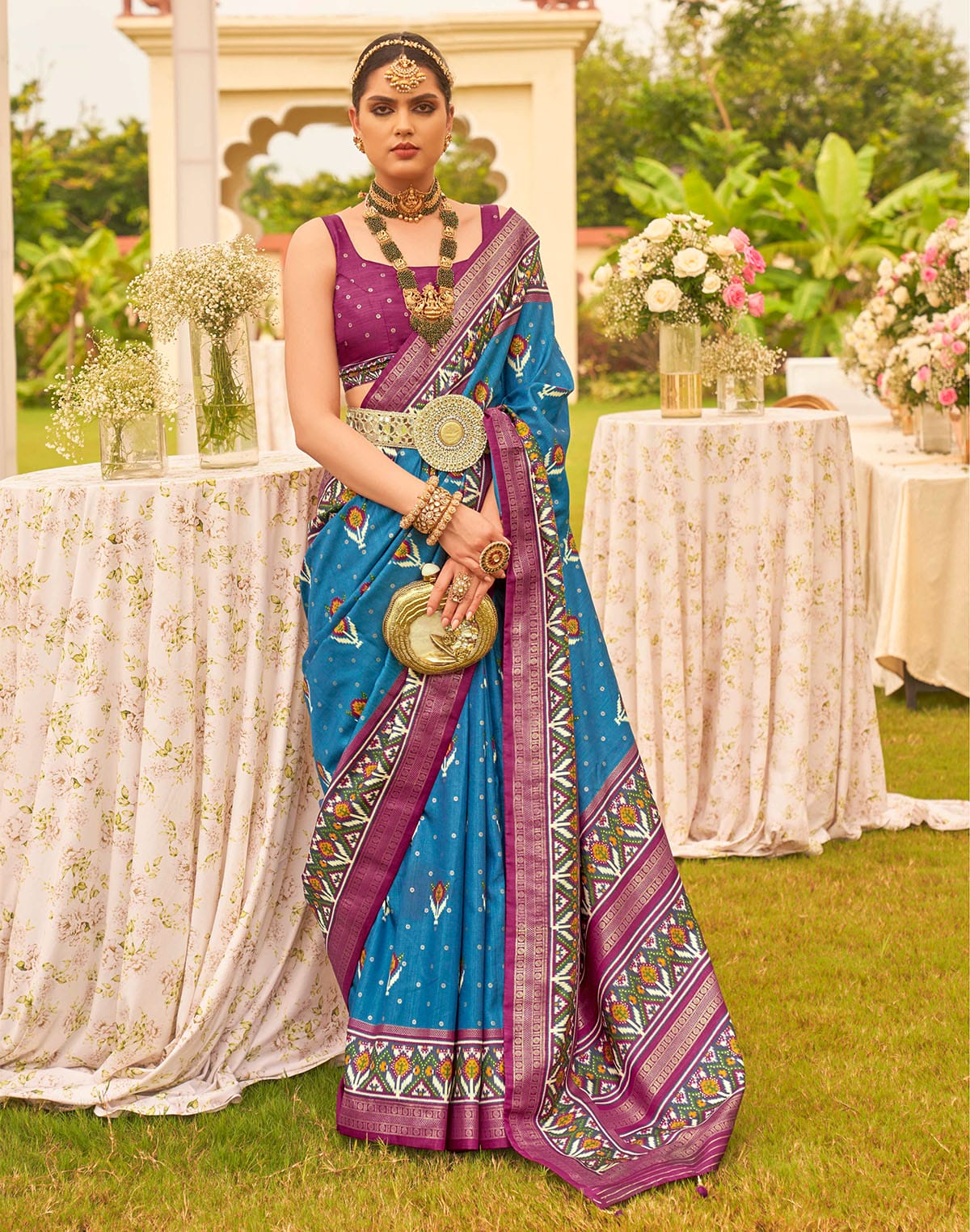 Collection of Captivating Blue Patola Silk Floral Festive Wear Saree in a gallery layout