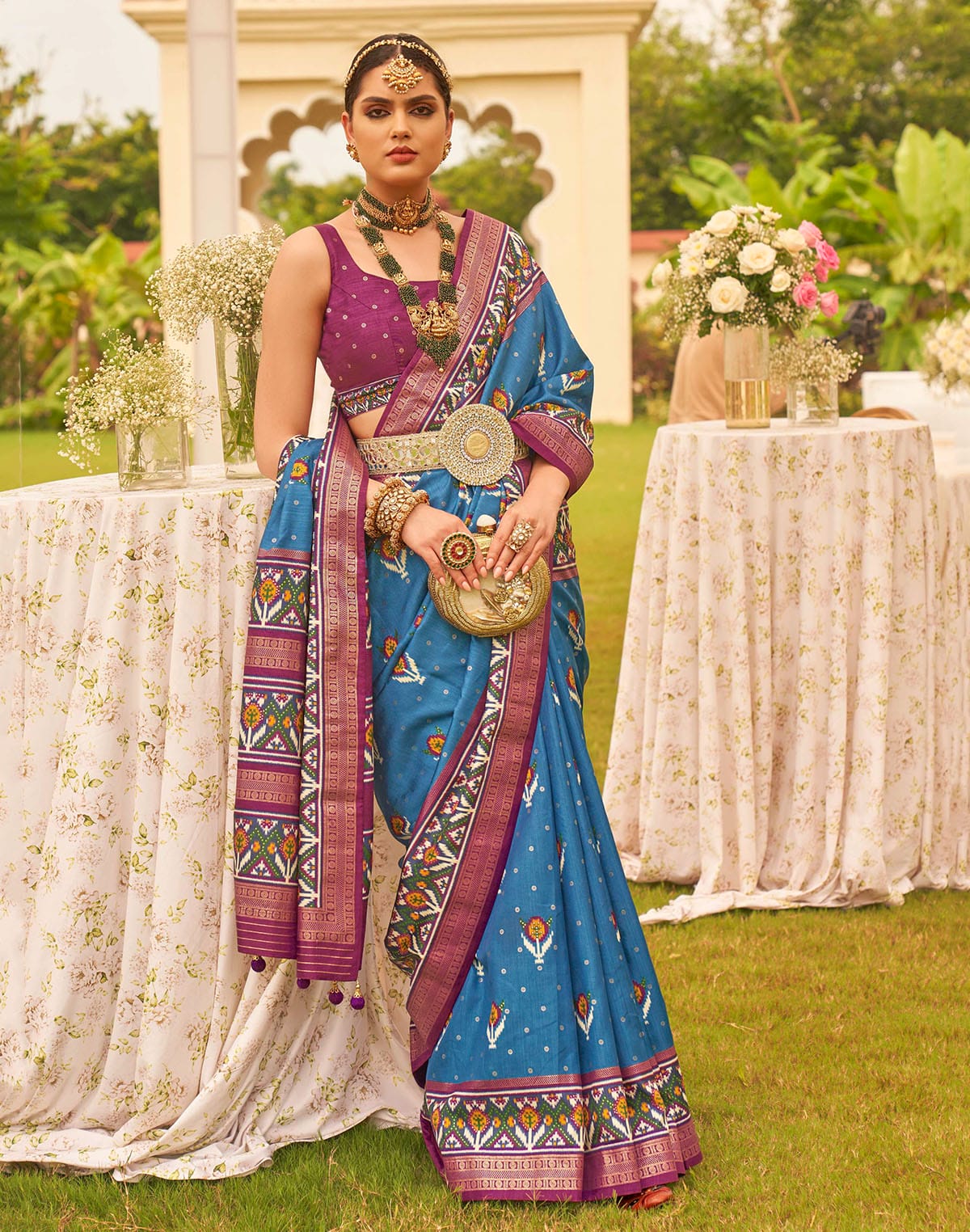 Collection of Captivating Blue Patola Silk Floral Festive Wear Saree in a gallery layout