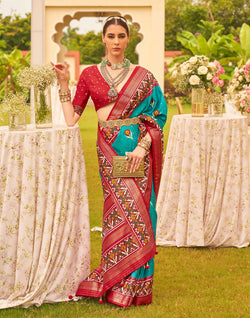 Collection of Dazzling Teal Blue Patola Print Trendy Saree in a gallery layout