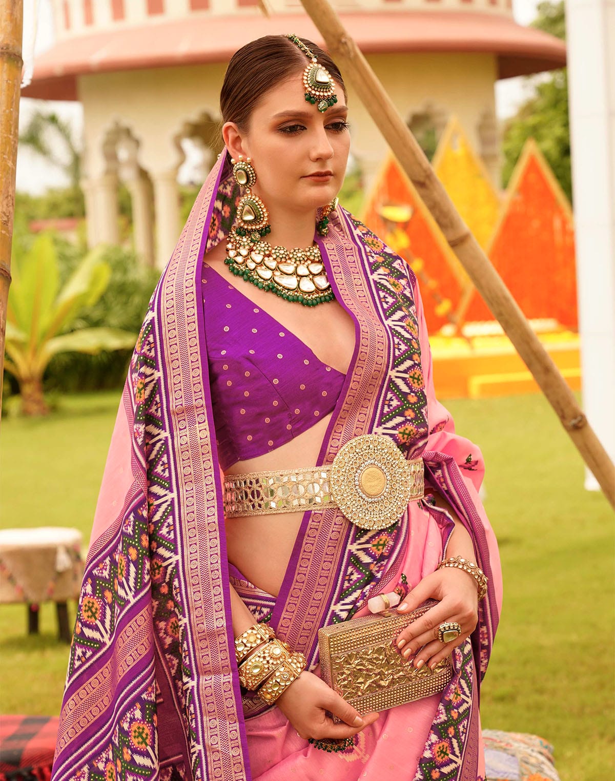 Collection of Decent Pink Coloured Floral Patola Silk Saree in a gallery layout