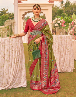 Collection of Stunning Mehendi Green Soft Patola Silk Saree in a gallery layout