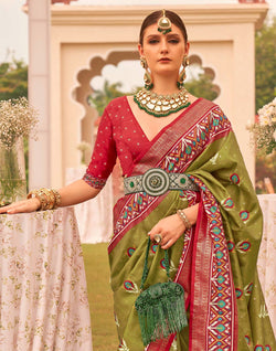 Collection of Stunning Mehendi Green Soft Patola Silk Saree in a gallery layout