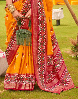 Collection of Attractive Yellow Colour Patola Saree in a gallery layout