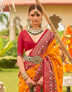 Collection of Attractive Yellow Colour Patola Saree in a gallery layout