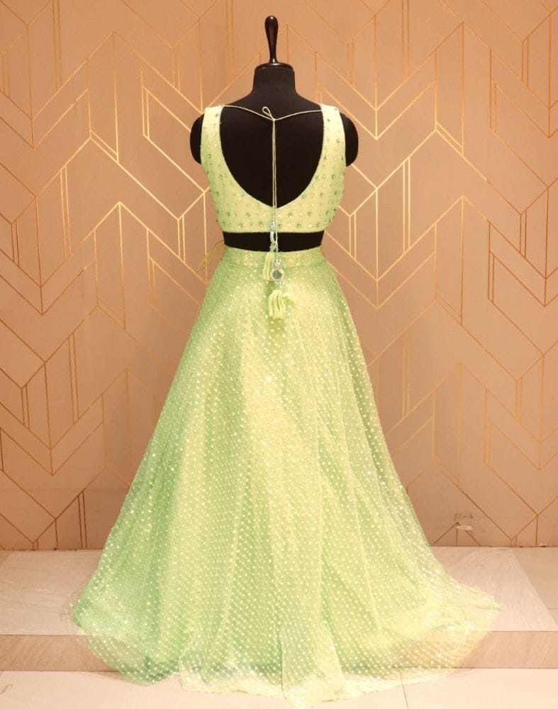 Collection of Pista Green Floral Embellished work Netted Crop Top and Lehenga Set in a gallery layout