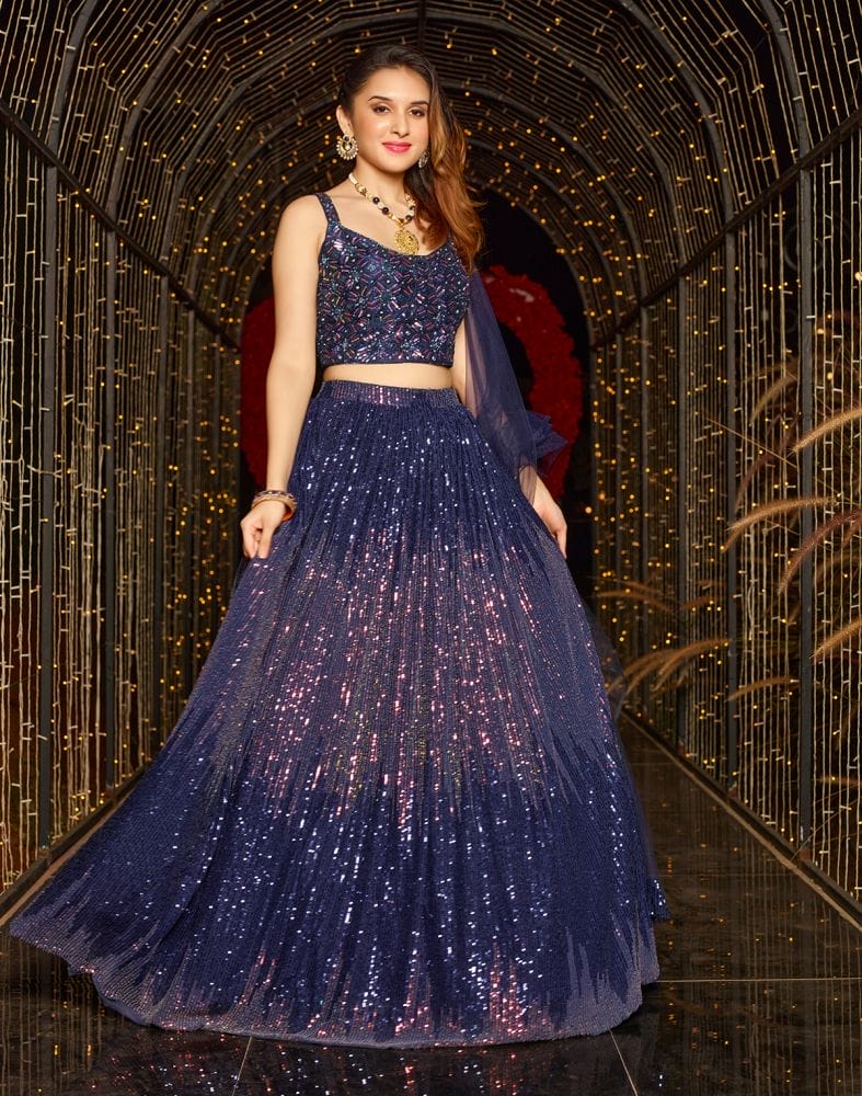 Collection of Designer Navy Blue Sequence Work Netted Crop Top and Lehenga Set in a gallery layout