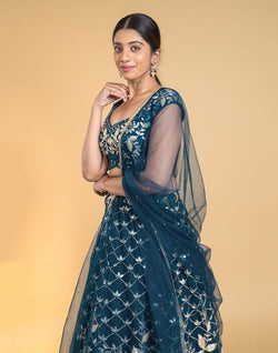 Collection of Designer Peacock Blue Floral Netted gotta patti Crop Top and lehenga set in a gallery layout