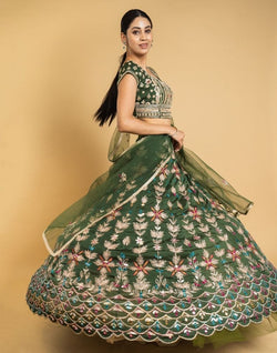 Collection of Designer Green Floral Gotta Patti Work Chiffon Crop Top and lehenga set in a gallery layout