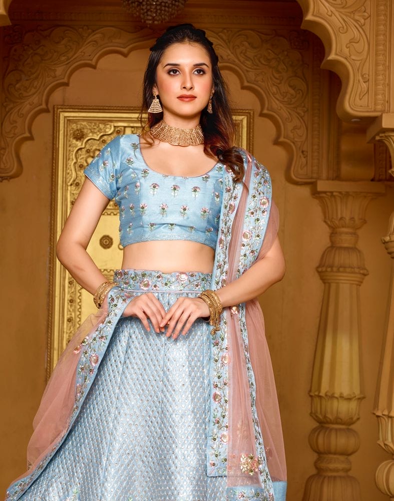 Collection of Designer Sky Blue Botanical Raw Silk Beads work Crop Top and Lehenga Set in a gallery layout