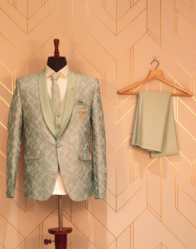 Collection of Stunning Pista Green Suit Set in a gallery layout