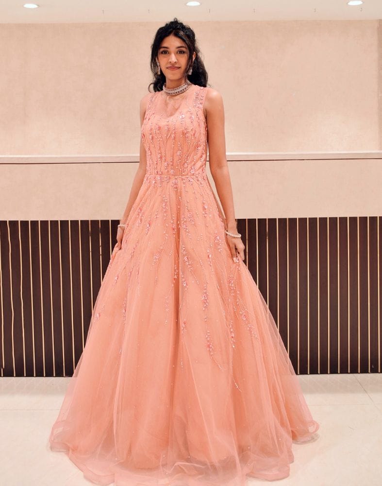 Peach fully flared Netted Embellished Gown