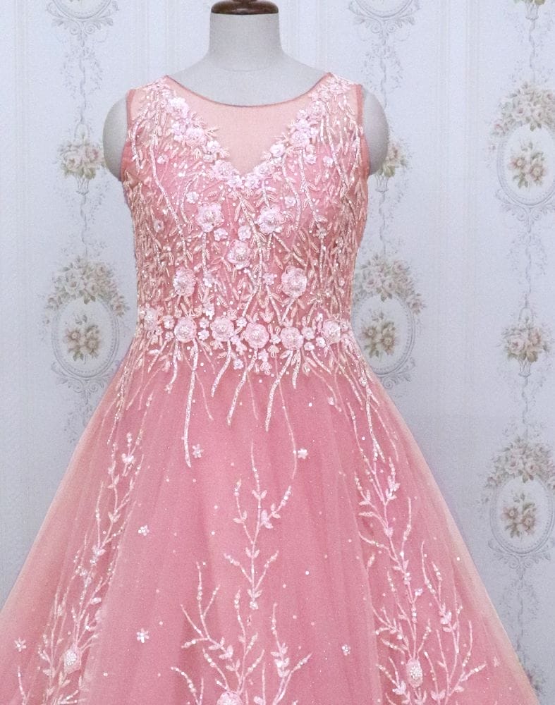 Collection of Pink designer netted Embellished Gown with mask in a gallery layout