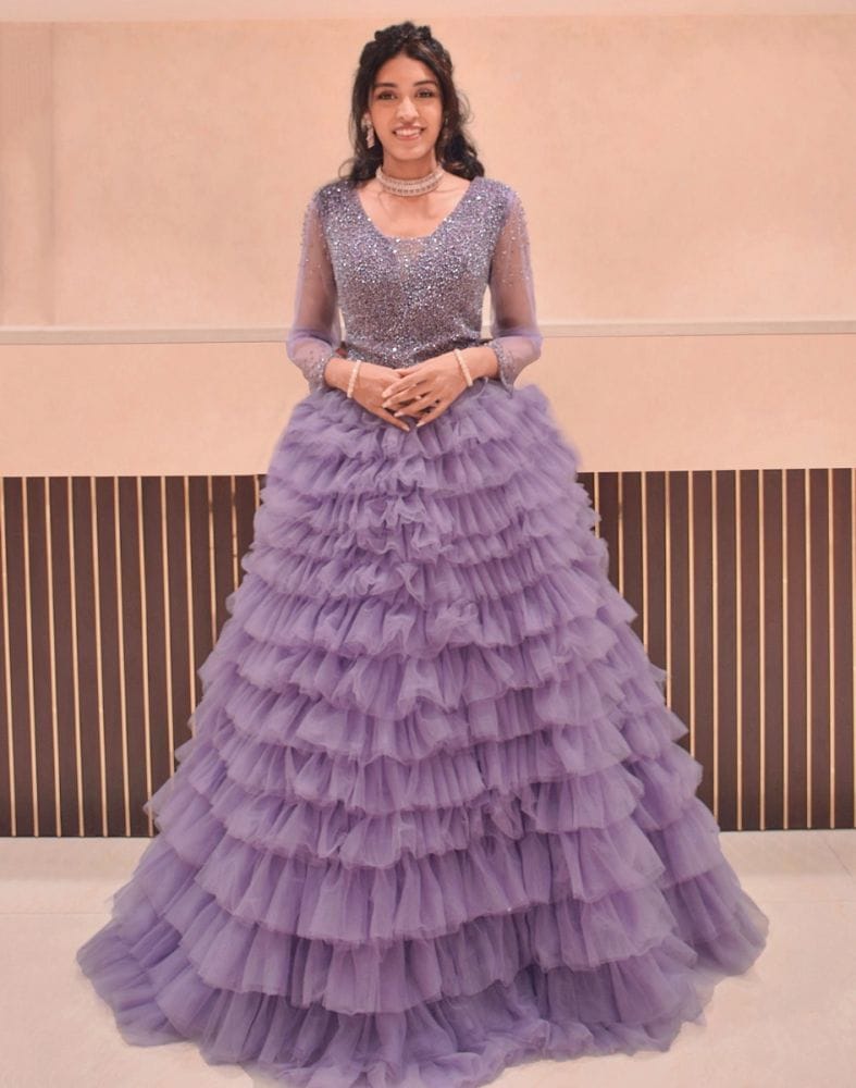 Designer Violet fully flared Netted Pearls work Gown