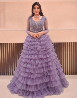 Collection of Designer Violet fully flared Netted Pearls work Gown in a gallery layout