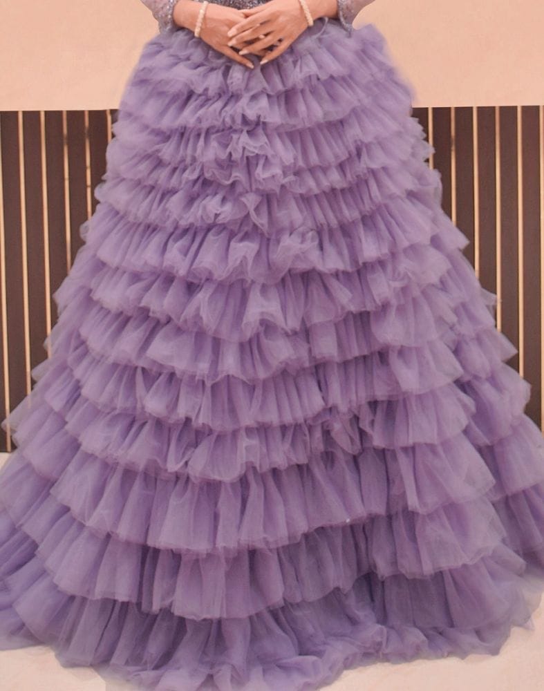 Collection of Designer Violet fully flared Netted Pearls work Gown in a gallery layout