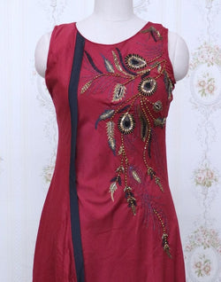 Collection of Maroon Silk Kundhan work Kurti in a gallery layout