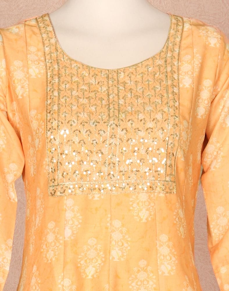 Collection of Light Orange Floral Embellished work Silk Kurti in a gallery layout