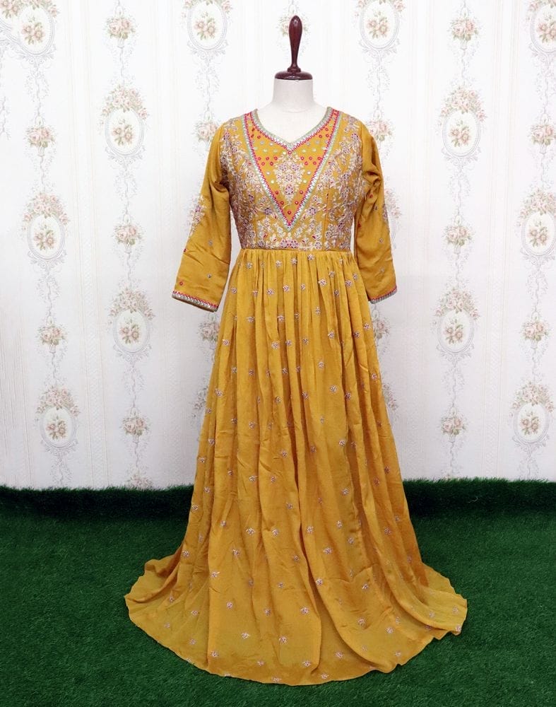 Collection of Mustard Semi Georgette fabric Kurti with Dupatta in a gallery layout