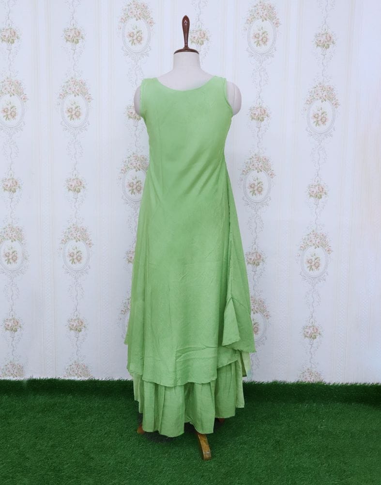 Collection of Light Green Floral Cotton Silk Stones work Kurti in a gallery layout