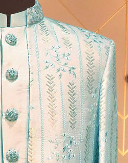 Collection of Sky Blue Raw Silk Embellished work Kurta Jacket Set in a gallery layout