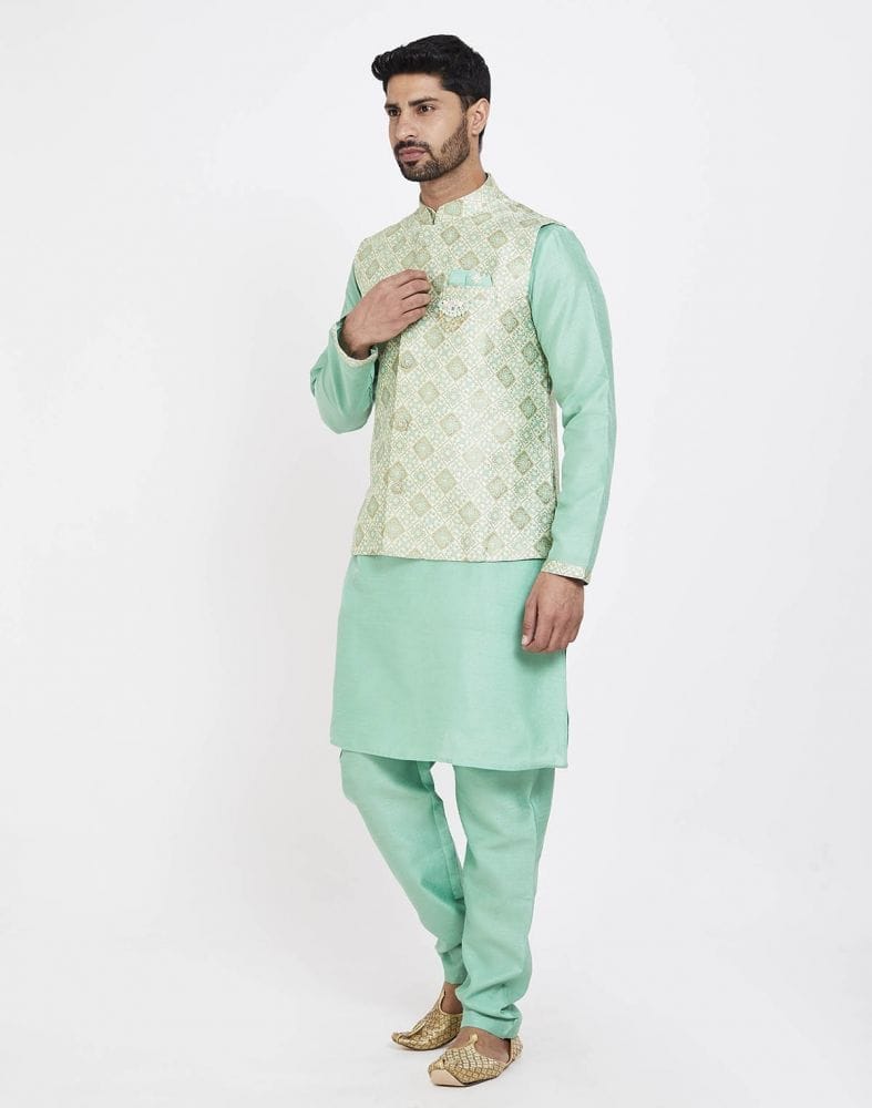 Collection of Light Green Self Highlighted Design Kurta Set in a gallery layout