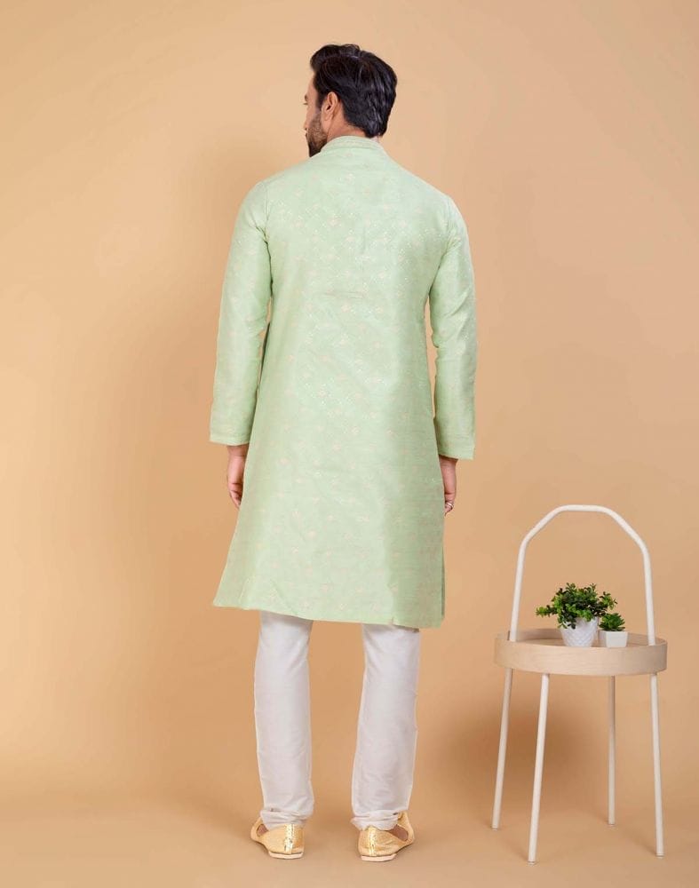 Collection of All Over Self Design Mehendi Green Jacquard and Printed Kurta Set in a gallery layout