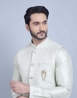 Collection of Stylish Pista Green Raw Silk Sequence Kurta Jacket Set in a gallery layout