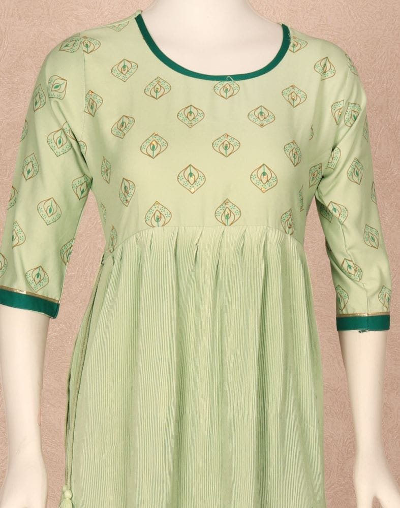 Collection of Light Green Floral Print Cotton Silk Kurti in a gallery layout