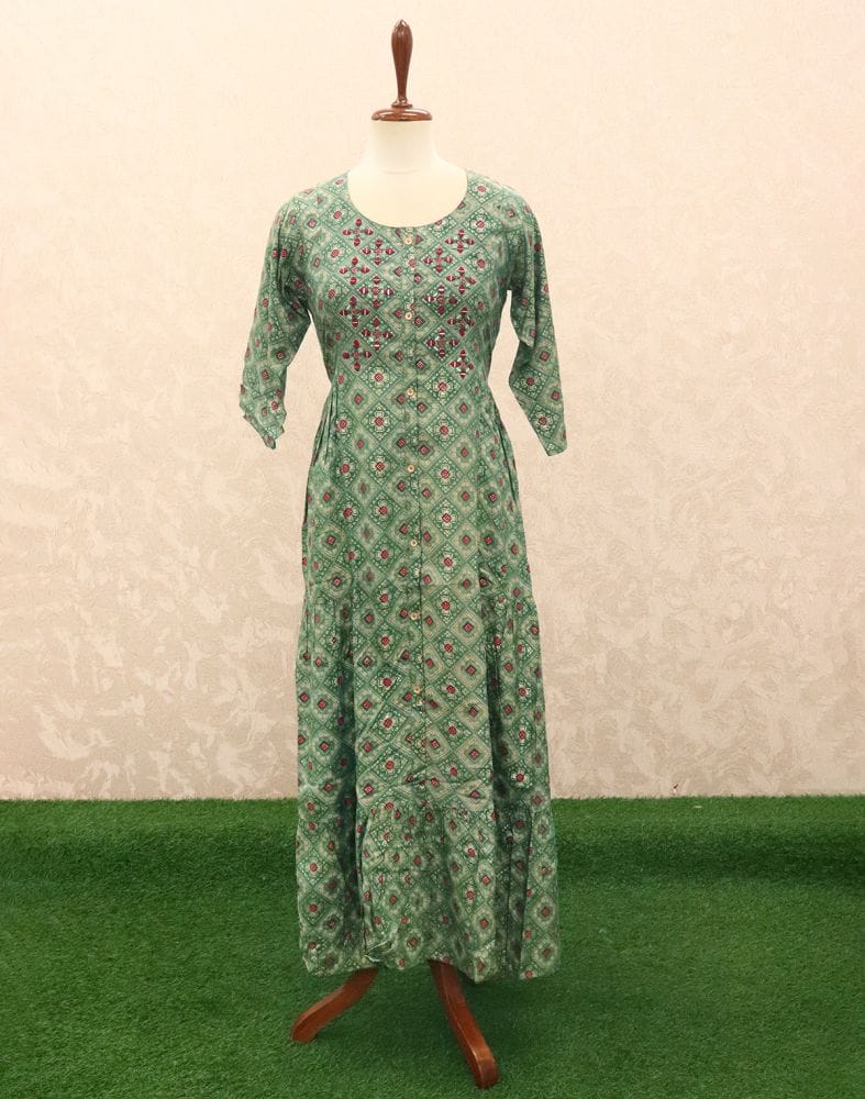 Collection of Green Geometric Mirror work Silk Kurti in a gallery layout