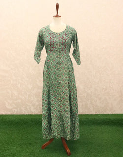 Collection of Green Geometric Mirror work Silk Kurti in a gallery layout