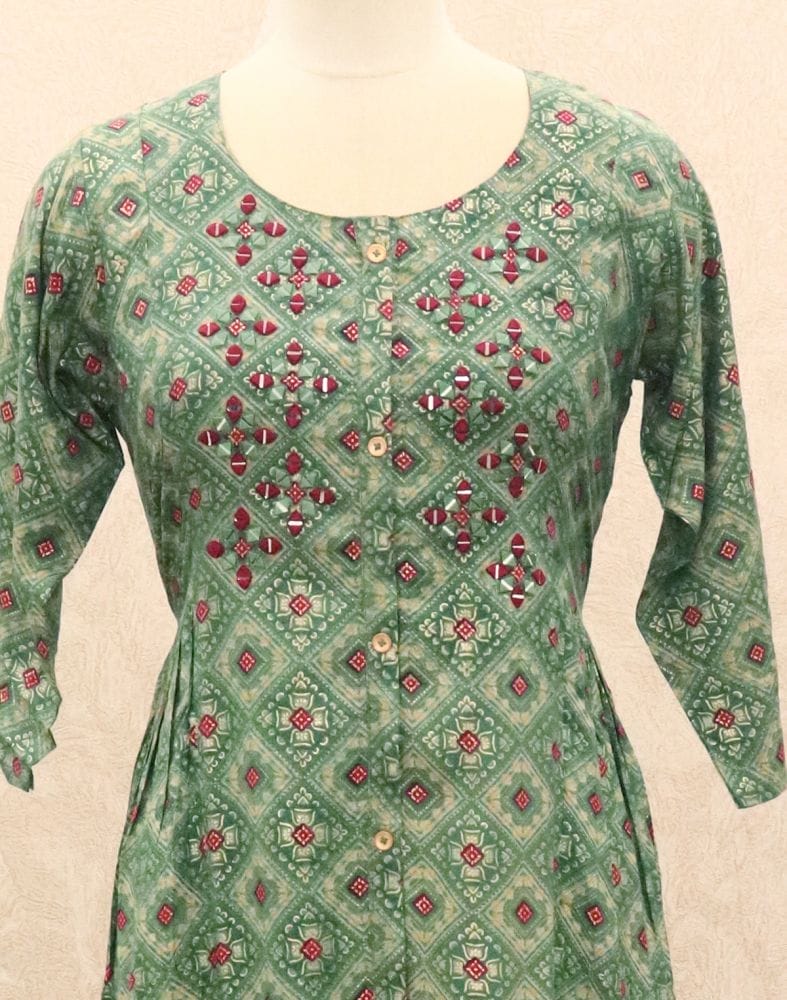 Collection of Green Geometric Mirror work Silk Kurti in a gallery layout