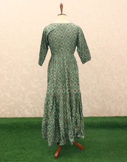 Collection of Green Geometric Mirror work Silk Kurti in a gallery layout