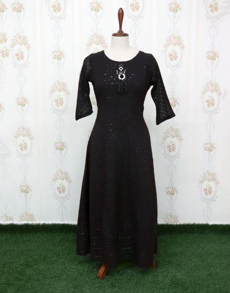 Collection of Black Self Design Georgette Embellished Kurti in a gallery layout