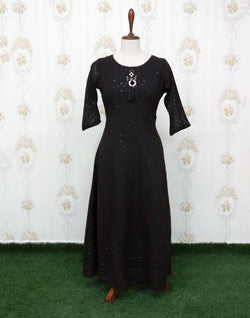 Collection of Black Self Design Georgette Embellished Kurti in a gallery layout