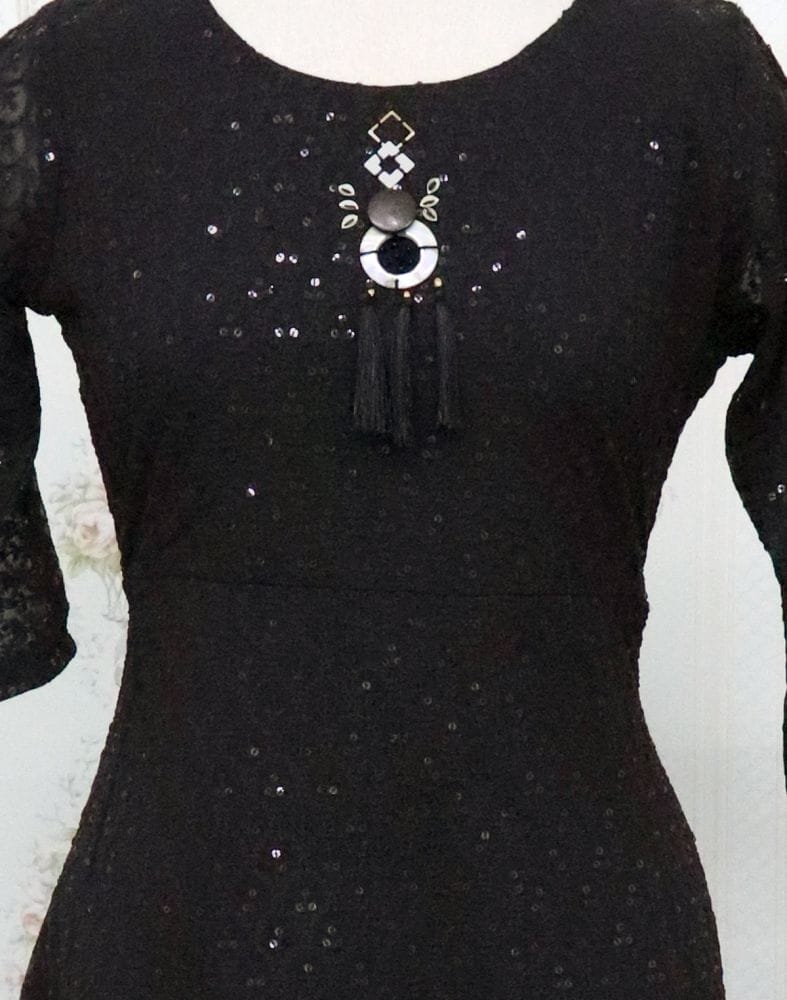 Collection of Black Self Design Georgette Embellished Kurti in a gallery layout