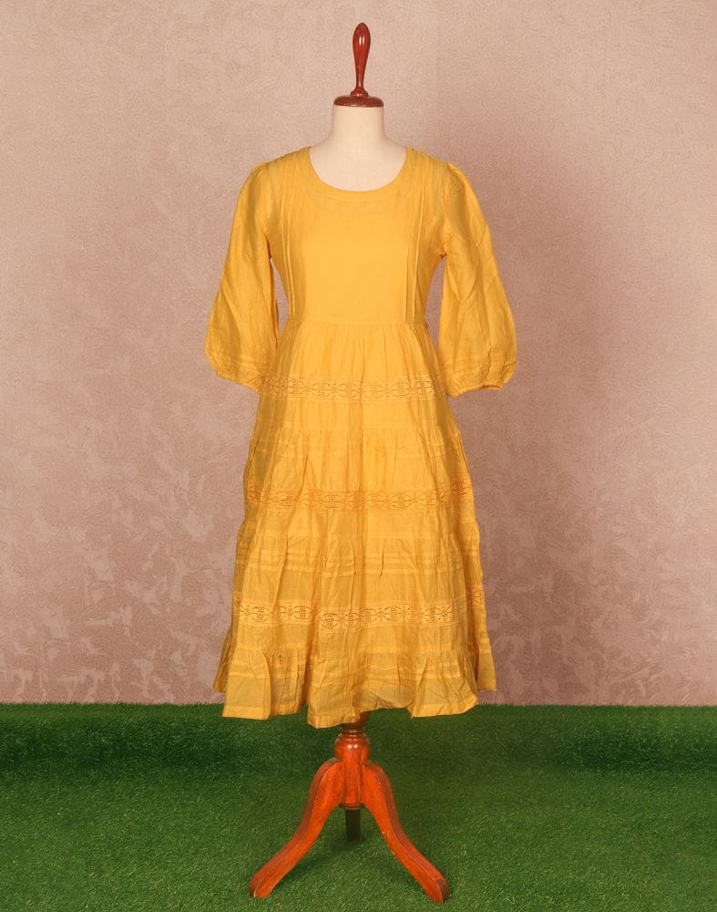 Collection of Mustard Coloured Plain Cotton Kurti in a gallery layout