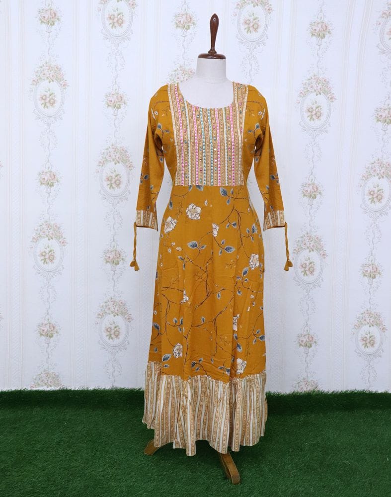 Collection of Mustard Floral Cotton Mirror Kurti in a gallery layout