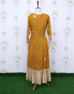 Collection of Mustard Floral Cotton Mirror Kurti in a gallery layout