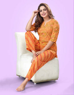 Collection of Orange Bandhini Cotton Printed Night Suit in a gallery layout