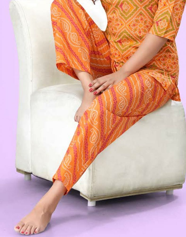 Collection of Orange Bandhini Cotton Printed Night Suit in a gallery layout